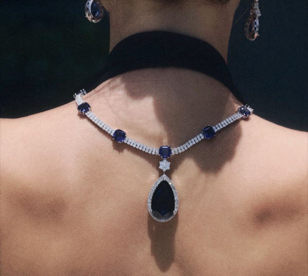 Sapphire and diamond necklace worn low on the back