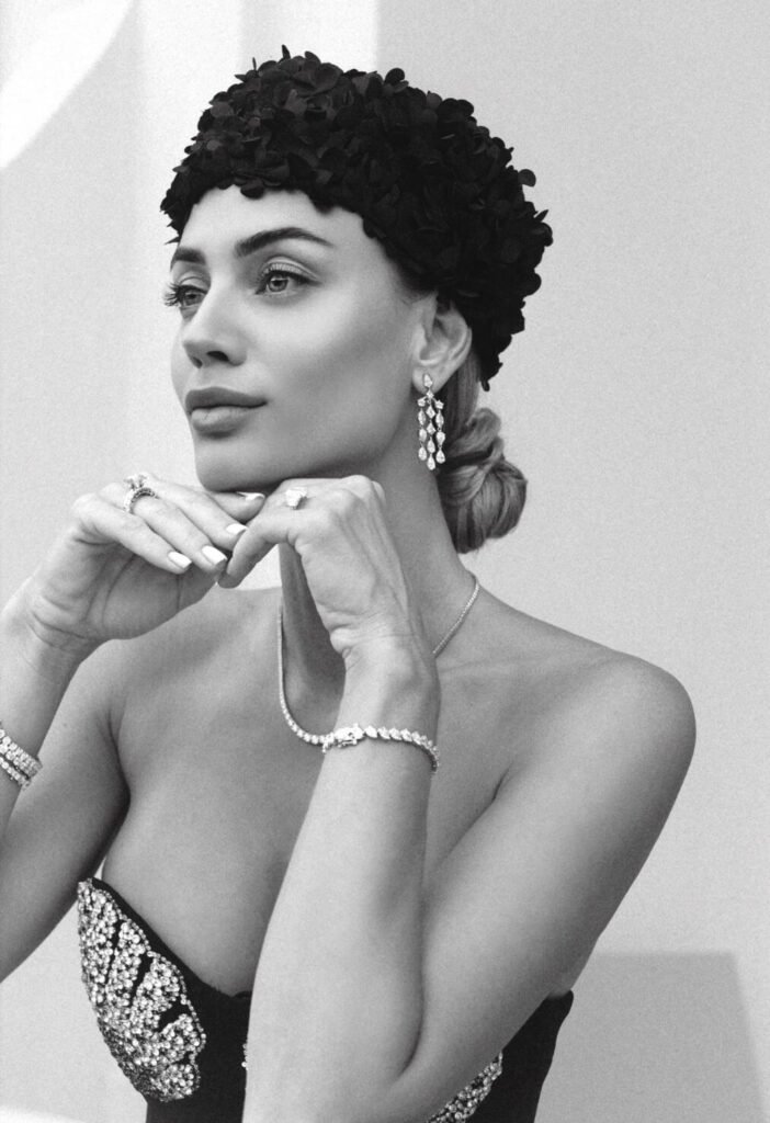 Portrait with chandelier diamond earrings, tennis necklace and bracelets